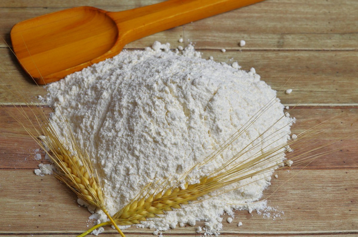 Wheat flour with ears of wheat